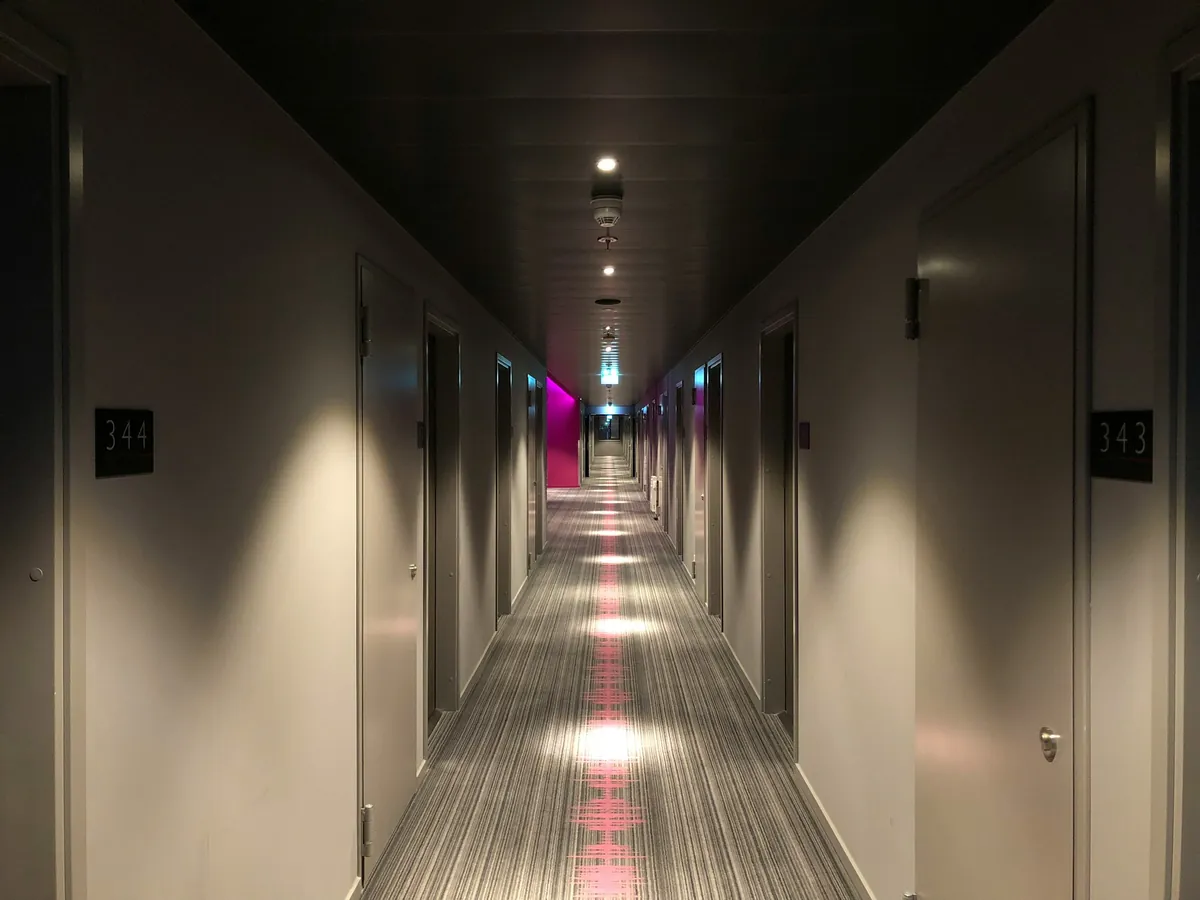 A hotel corridor at night